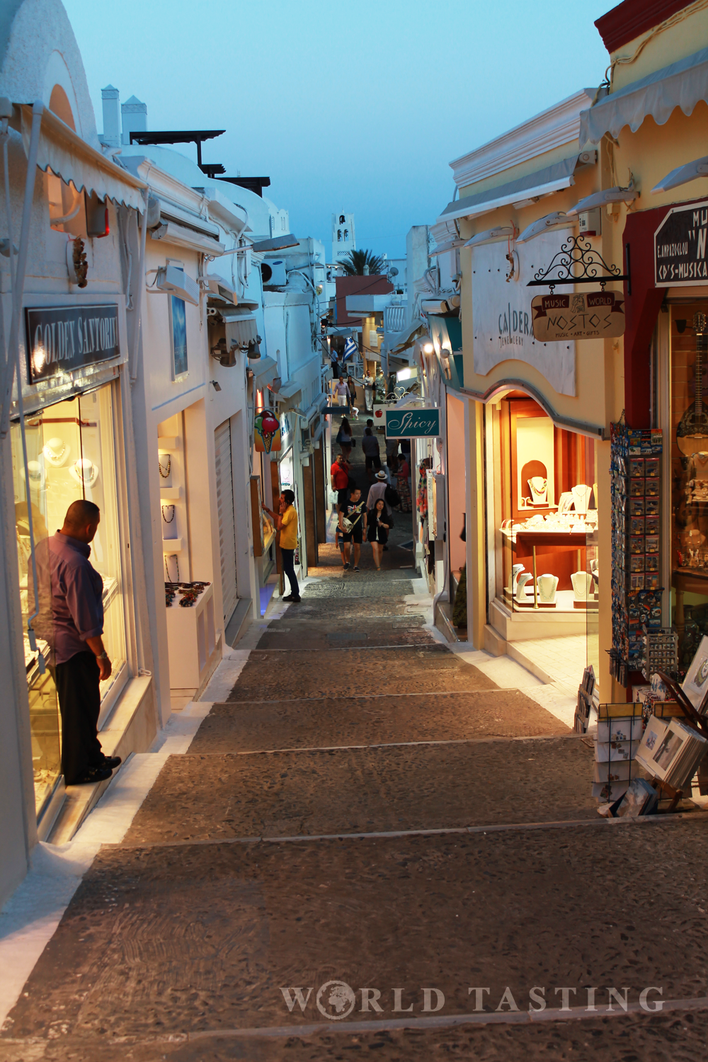 Small streets and jewelry shops are typical for Fira