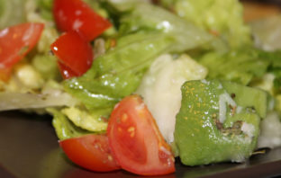 Little Gem salad with cherry tomatoes and avocado